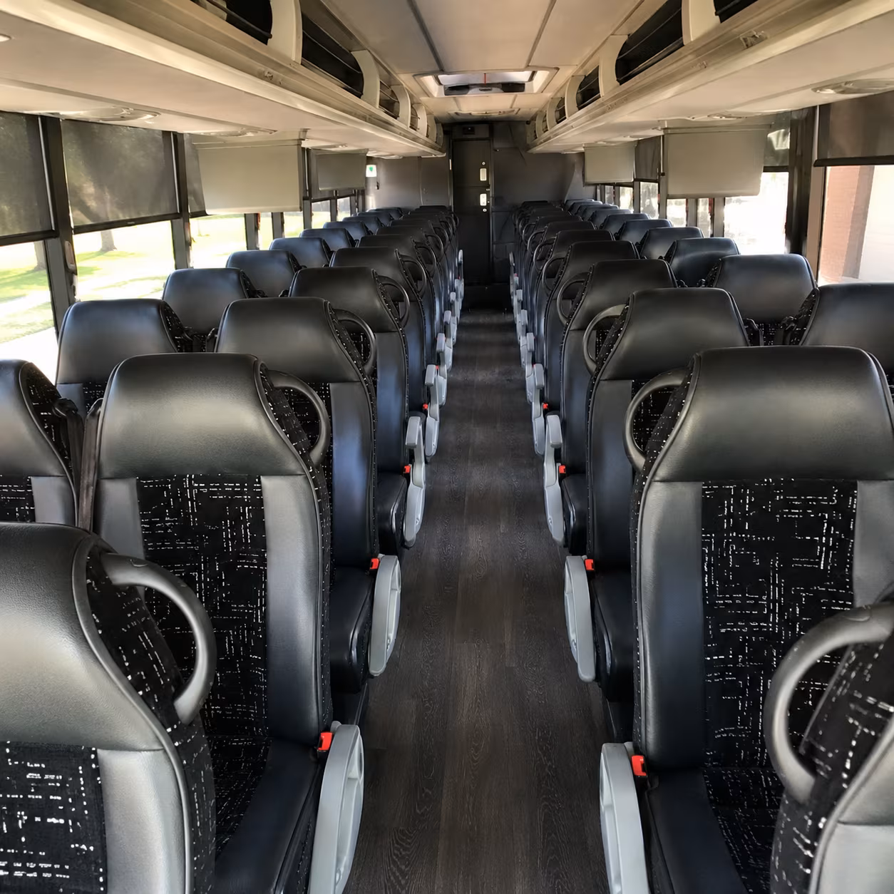 charter bus shuttle service between hector international airport and fargo hotels